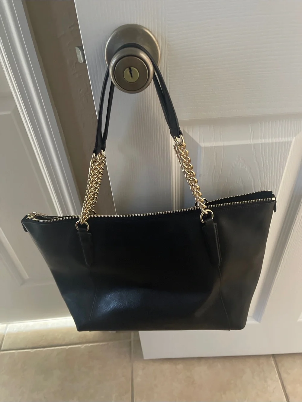 Coach sleek black